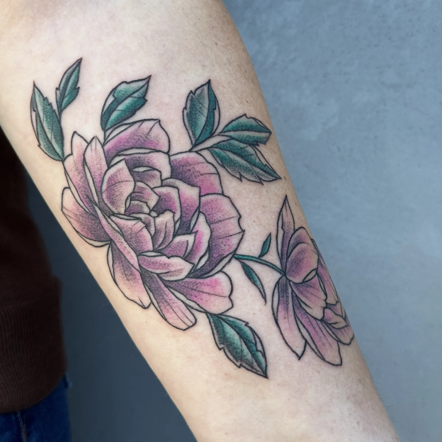 Pink flower tattoo